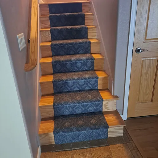 custom carpet stair runner in hardwood foyer CO