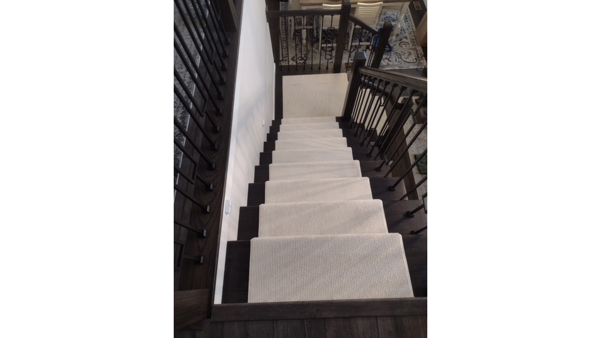 Modern home featuring stair runner
