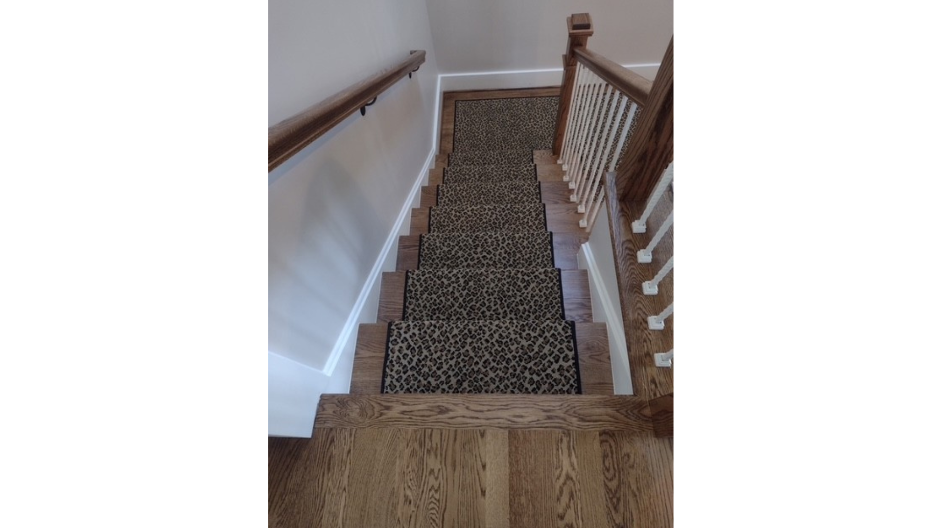 Custom staircase makeover with carpet runner